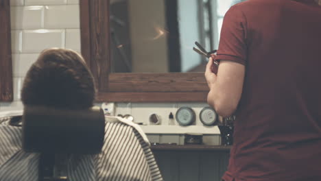 Barper-preparing-working.-Hairdresser-salon.-Shaving-razor.-Barber-razor